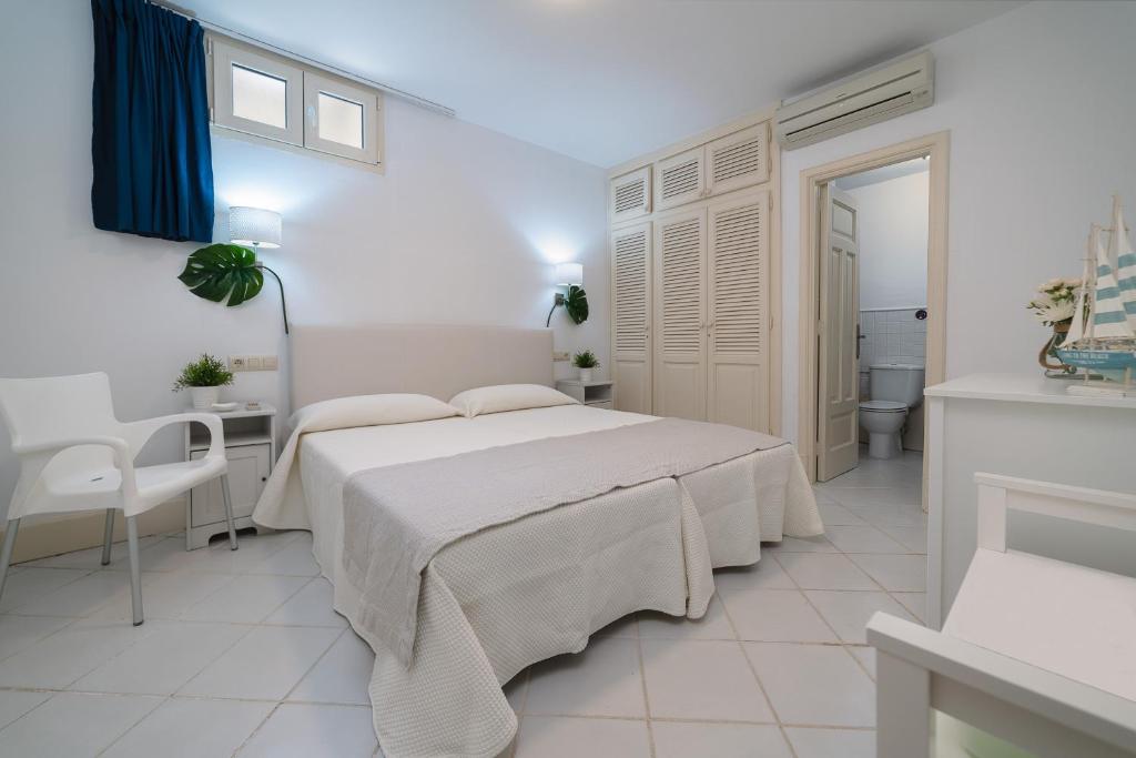 A bed or beds in a room at VV Vista Oceano by HH - Ocean view with private pool