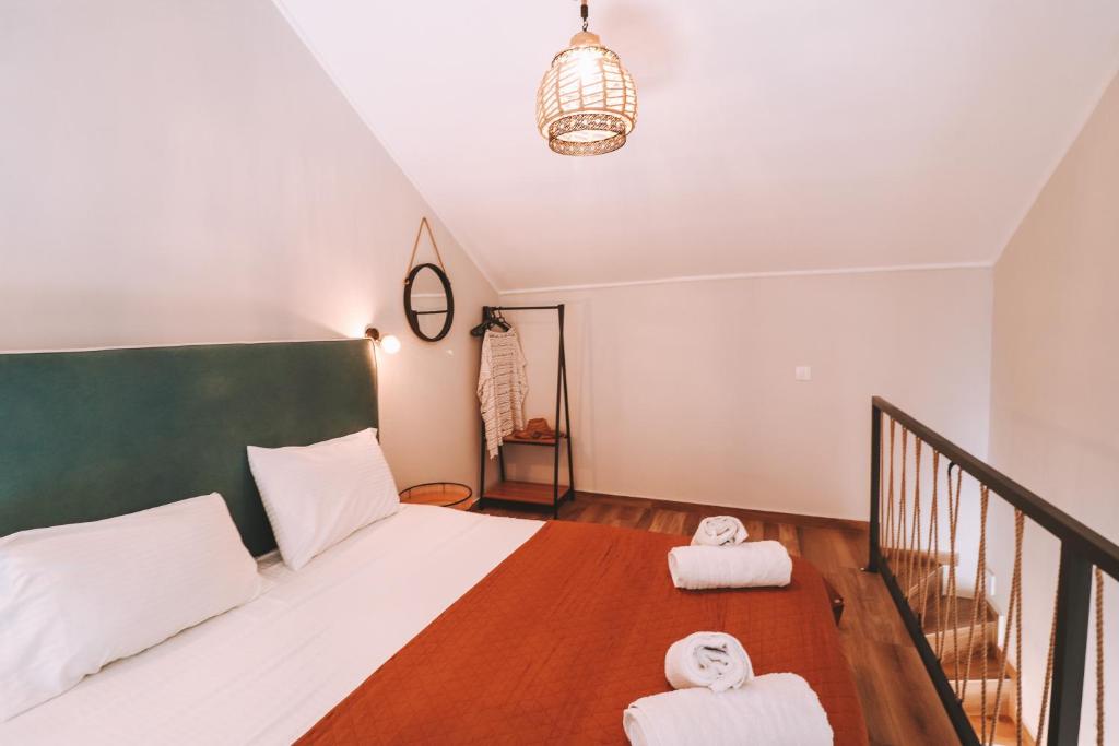 Posteľ alebo postele v izbe v ubytovaní Sithon Diamond Suites