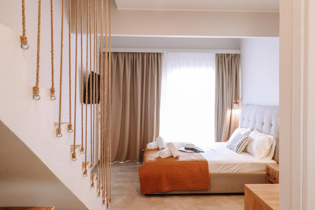 Posteľ alebo postele v izbe v ubytovaní Sithon Diamond Suites