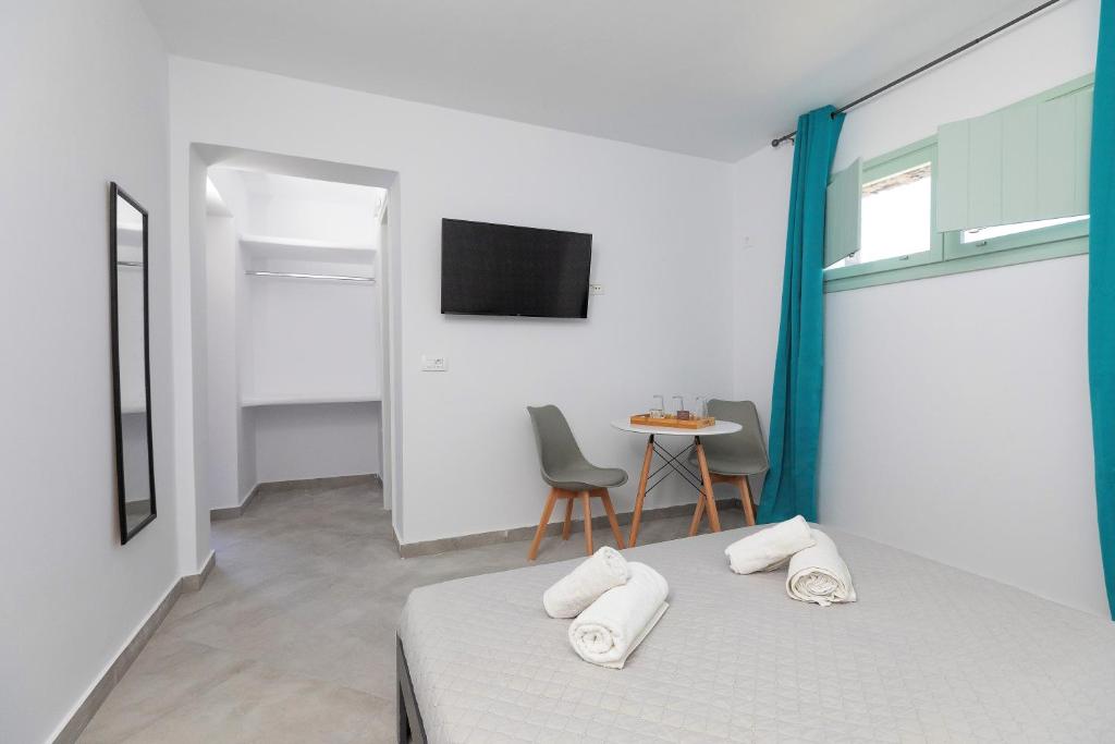 TV a/nebo společenská místnost v ubytování White Element