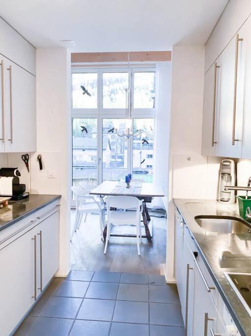 Kuchyň nebo kuchyňský kout v ubytování 4 1/2 Room Maisonette Apartment with great views