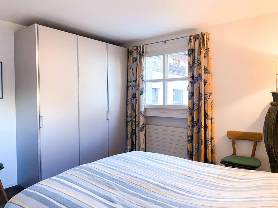 Postel nebo postele na pokoji v ubytování 4 1/2 Room Maisonette Apartment with great views