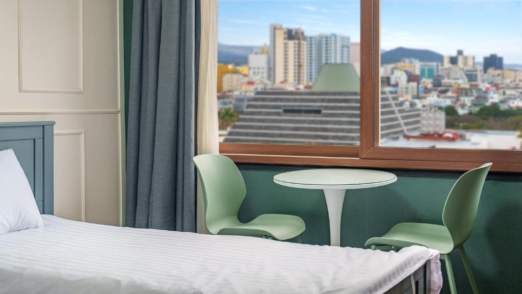 Postel nebo postele na pokoji v ubytování Hiker Hotel