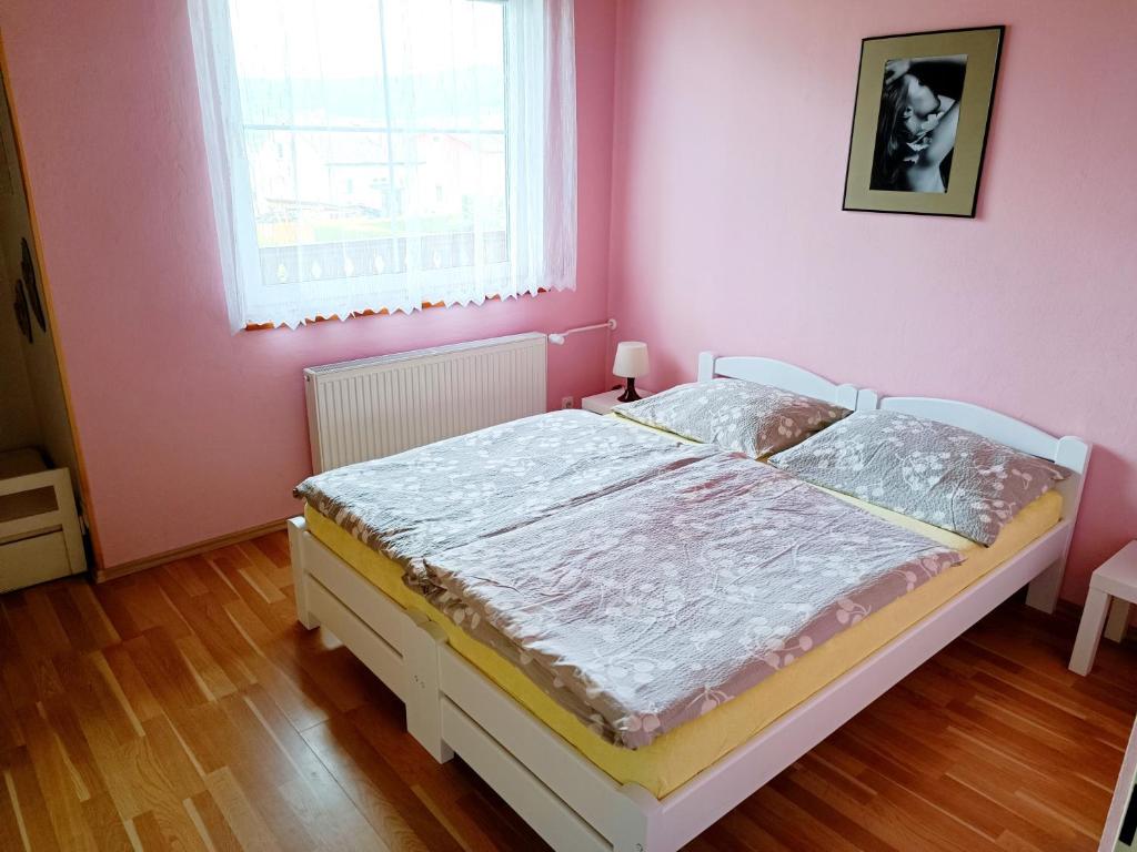 Postel nebo postele na pokoji v ubytování Vila Caba