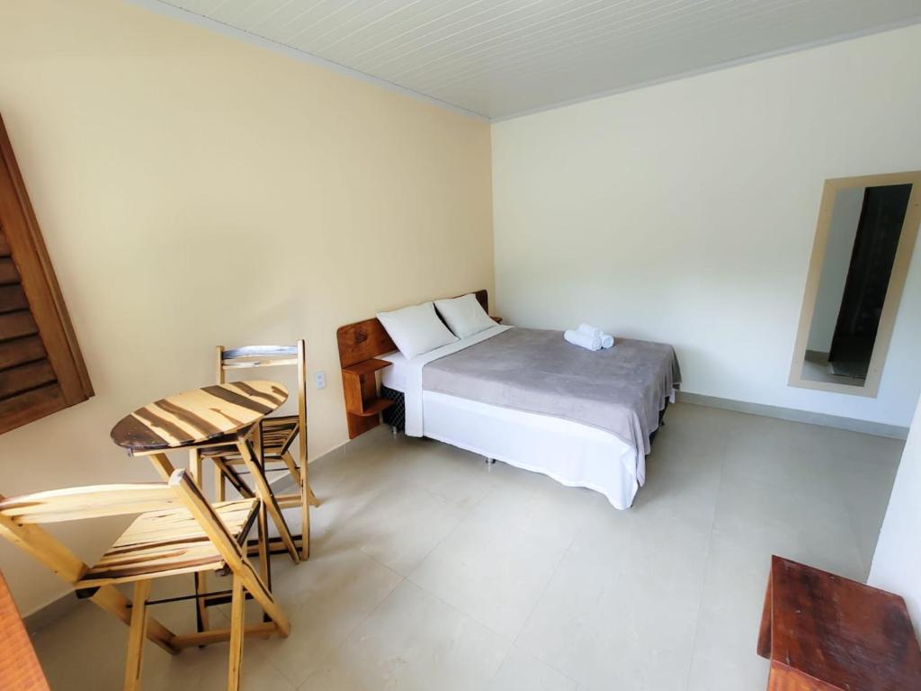 Postel nebo postele na pokoji v ubytování Pousada Maria do Ceú
