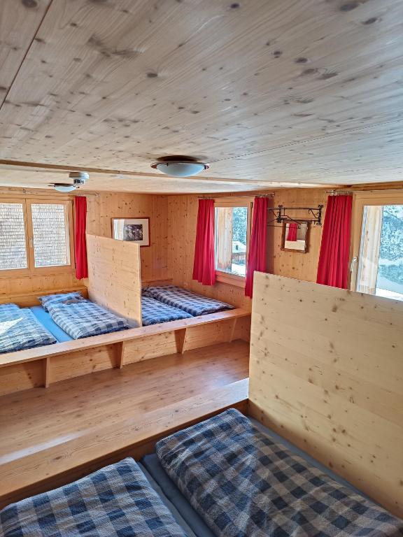 Postel nebo postele na pokoji v ubytování Berghaus Sulzfluh