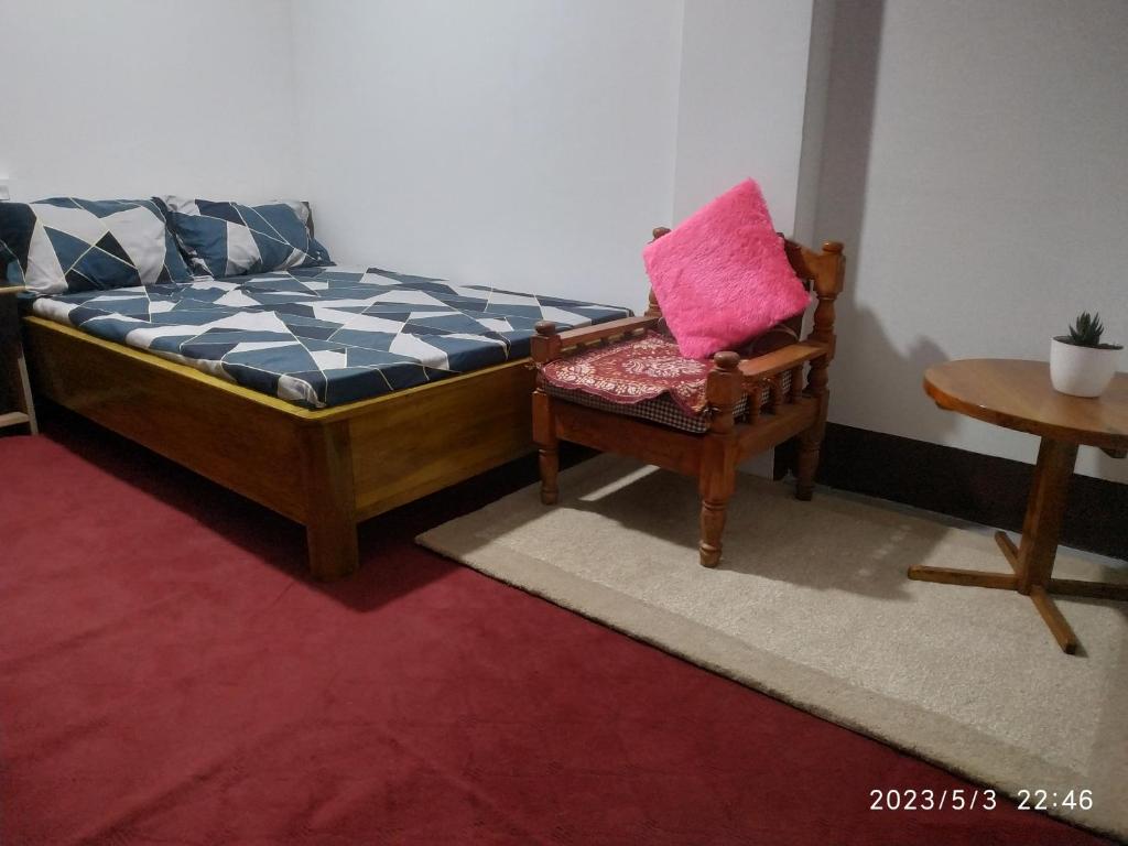 Postel nebo postele na pokoji v ubytování Dawn Home Stay