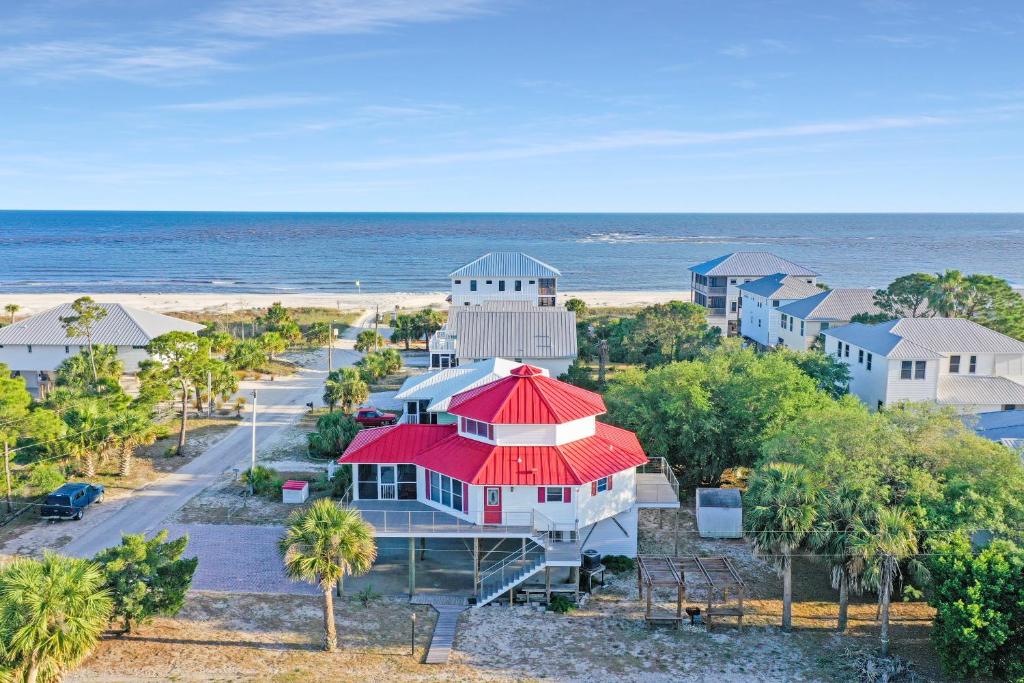 an aerial view of a beach house with a red roof at DeLight House by Pristine Properties Vacation Rentals in Indian Pass