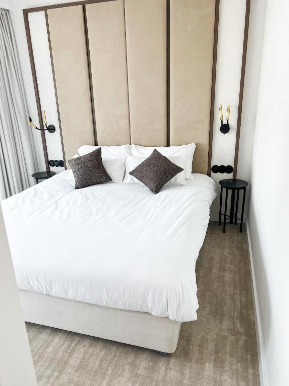 Posteľ alebo postele v izbe v ubytovaní Apartament Morski Widok Międzyzdroje