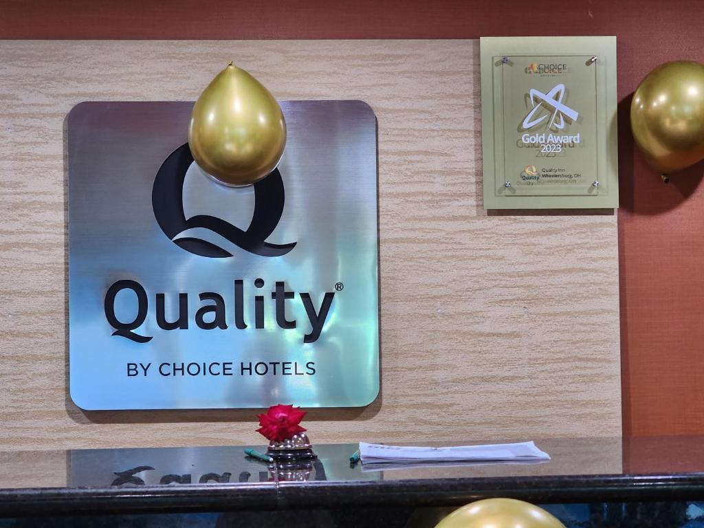 Certifikát, hodnocení, plakát nebo jiný dokument vystavený v ubytování Quality Inn