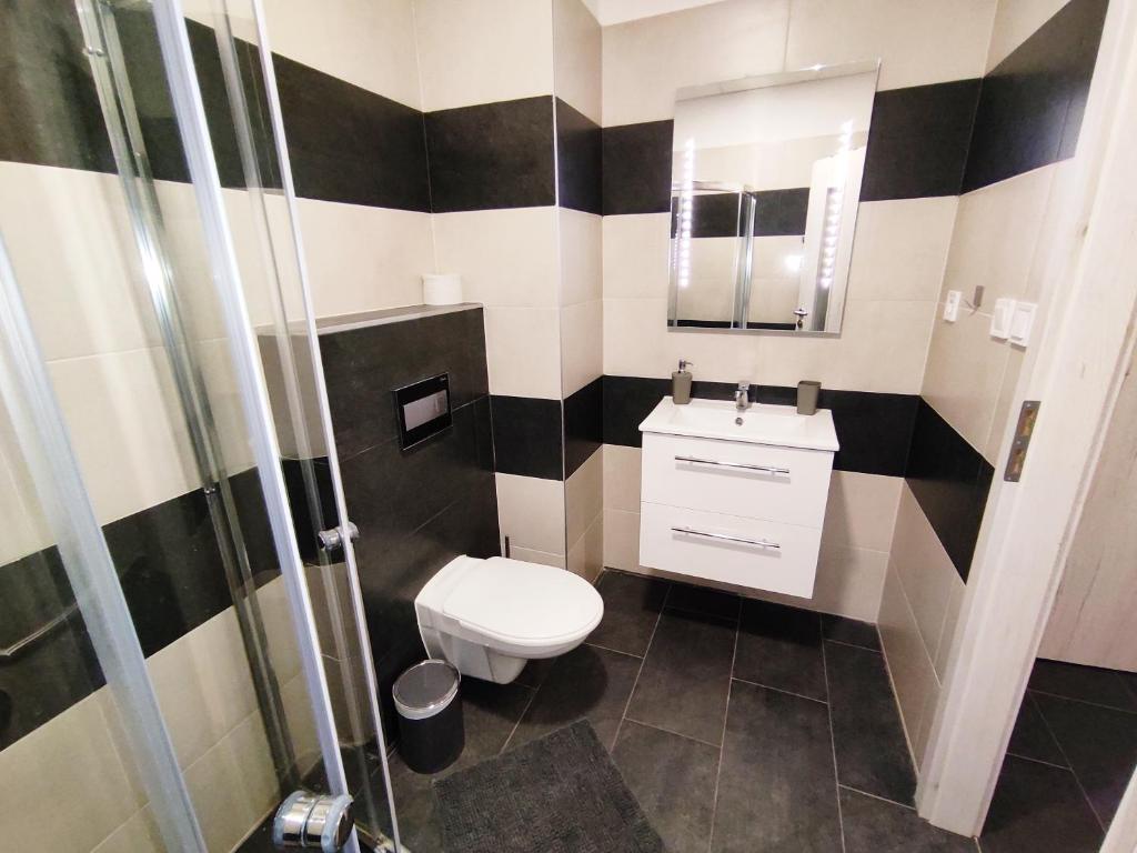 Koupelna v ubytování Hotel Slobi