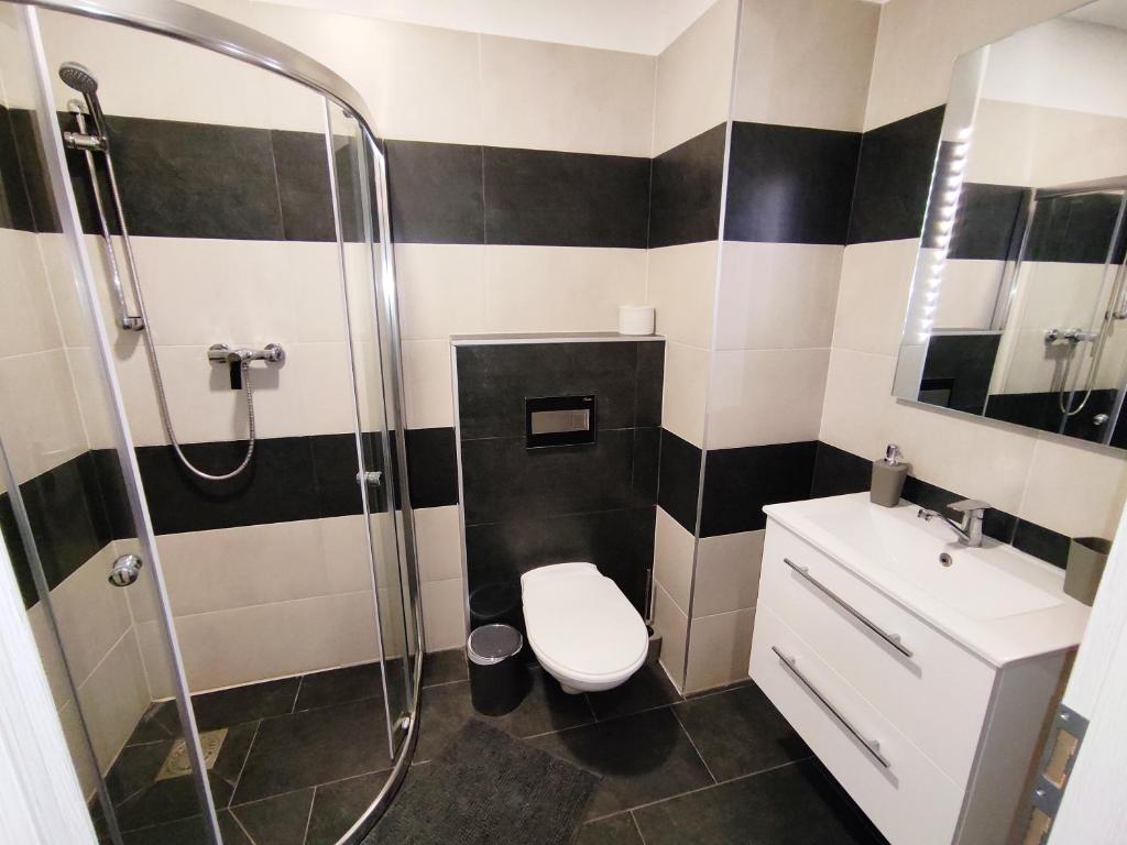 Koupelna v ubytování Hotel Slobi