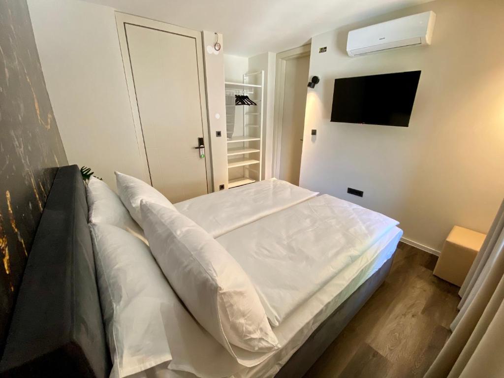 Postel nebo postele na pokoji v ubytování Boutique hotel ZBILJE