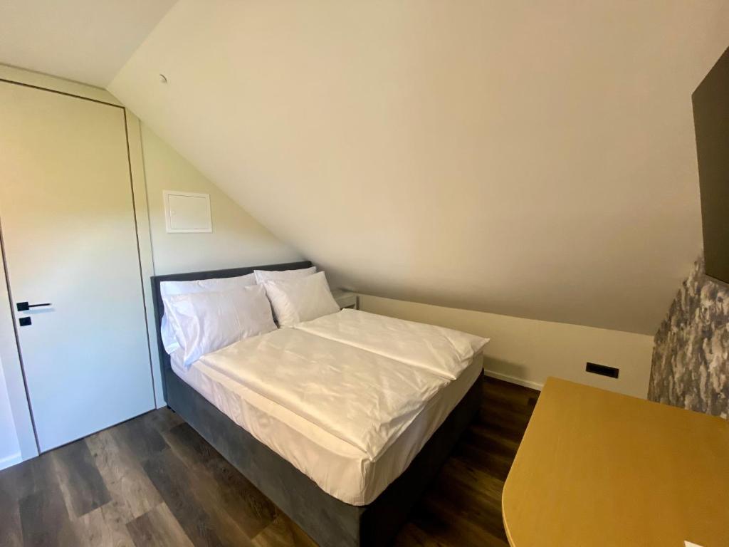 Postel nebo postele na pokoji v ubytování Boutique hotel ZBILJE