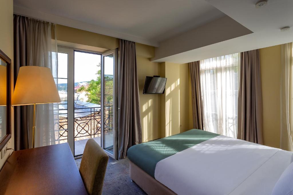 Postel nebo postele na pokoji v ubytování A5 Hotel