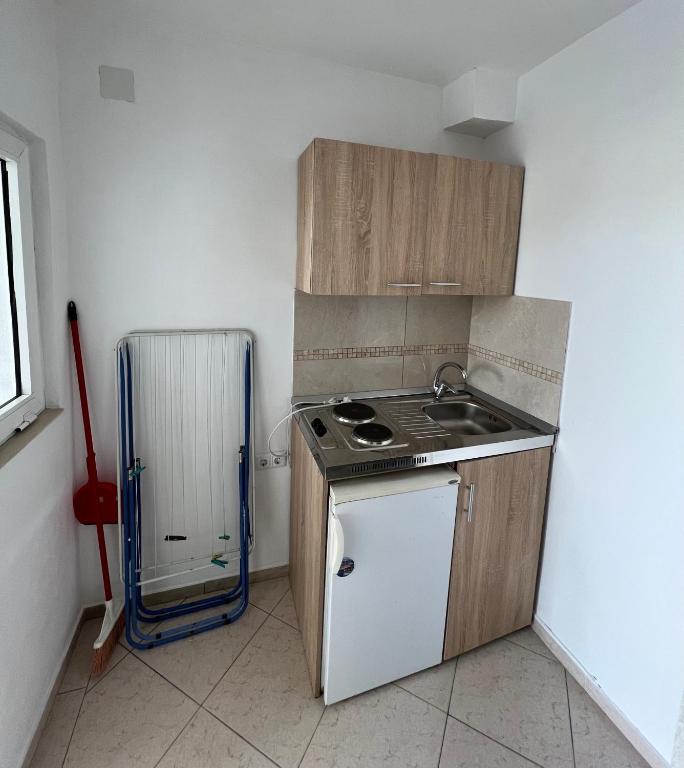 Kuchyň nebo kuchyňský kout v ubytování Apartments Beho