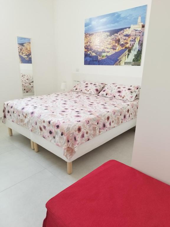 Postel nebo postele na pokoji v ubytování Le stanze del Maestro