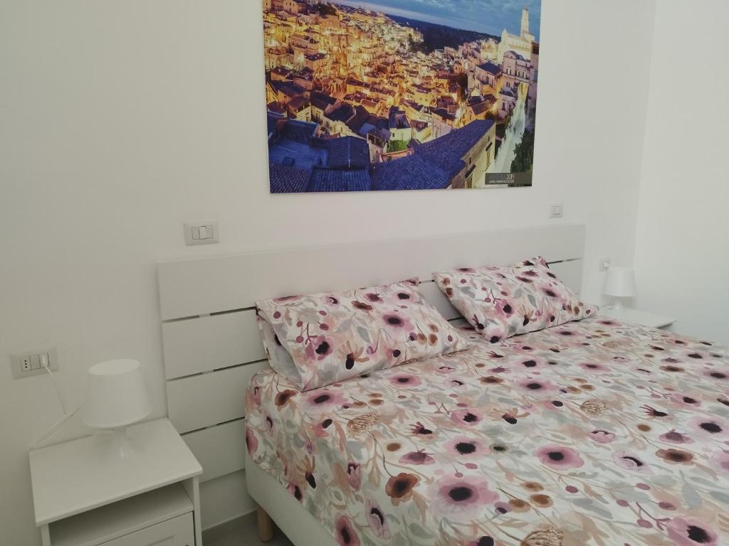Postel nebo postele na pokoji v ubytování Le stanze del Maestro