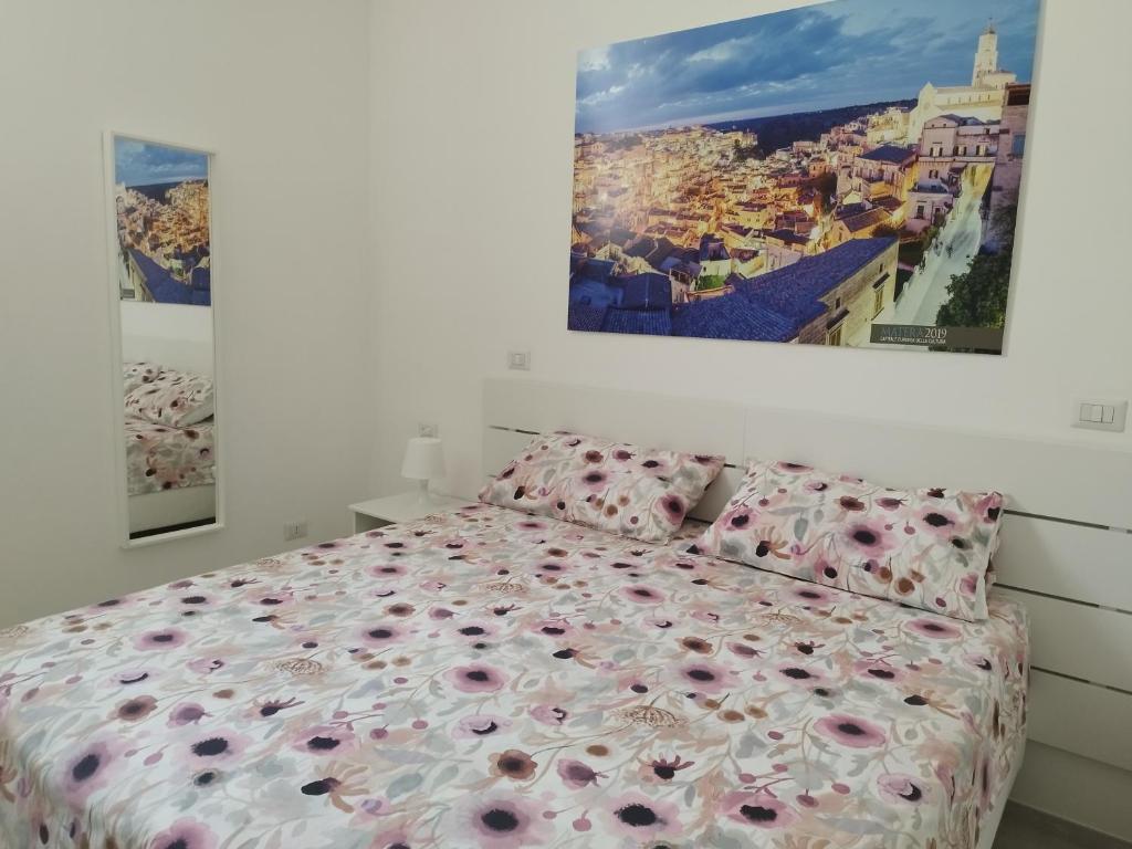 Postel nebo postele na pokoji v ubytování Le stanze del Maestro