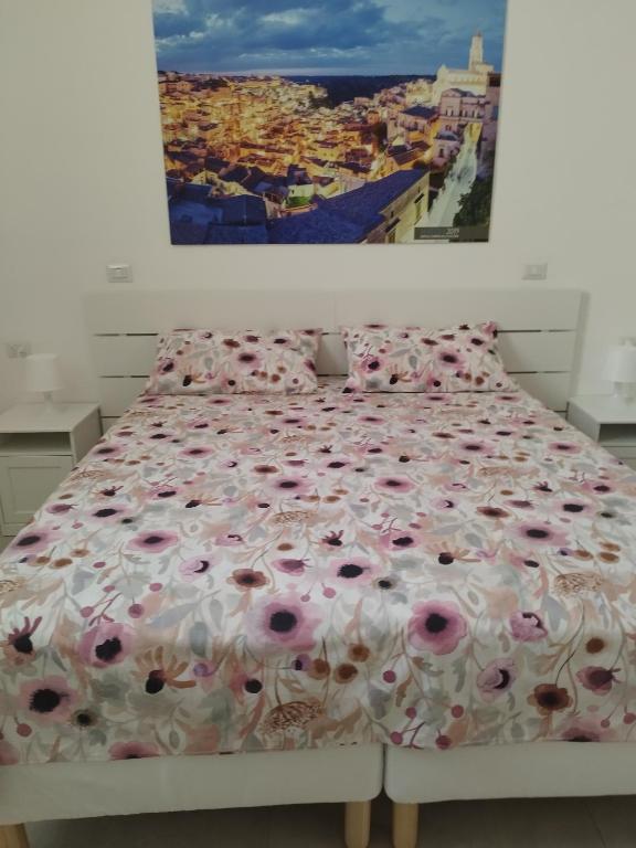 Postel nebo postele na pokoji v ubytování Le stanze del Maestro