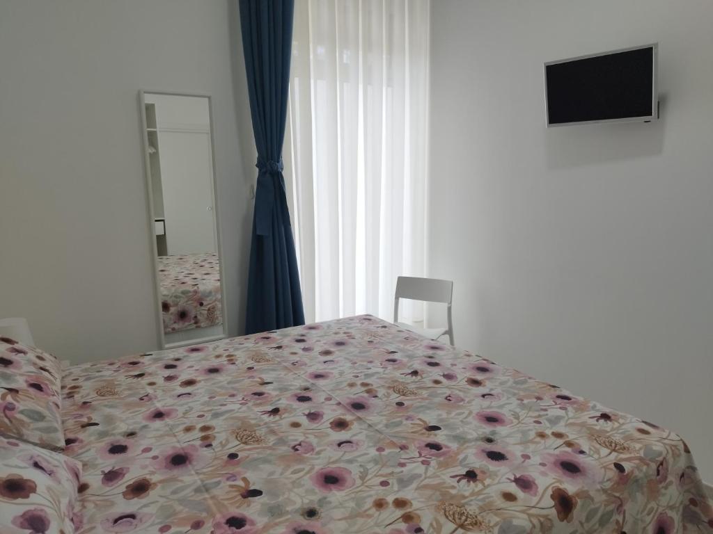 Postel nebo postele na pokoji v ubytování Le stanze del Maestro