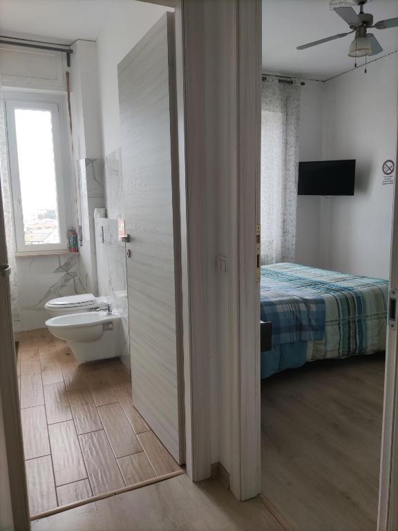 Postel nebo postele na pokoji v ubytování CASA BILO