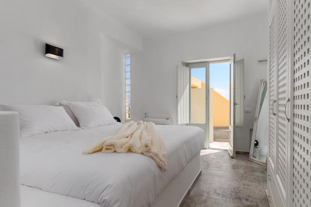 Letto o letti in una camera di Geminos Complex Villas