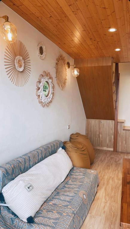 Postel nebo postele na pokoji v ubytování 幸福海衝浪民宿