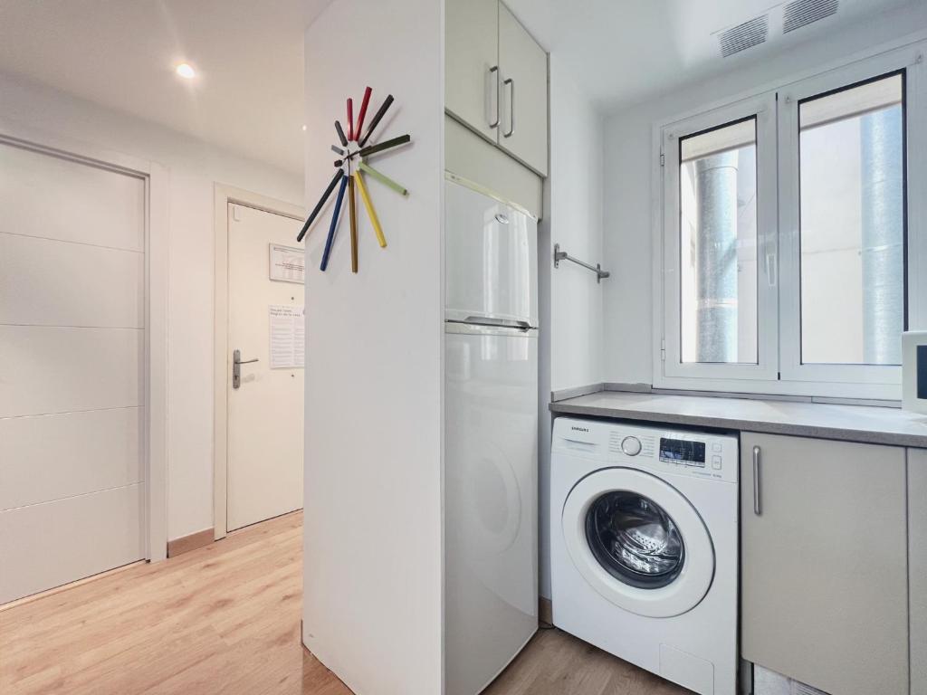 A kitchen or kitchenette at Stay U-nique Apartments Urquinaona II