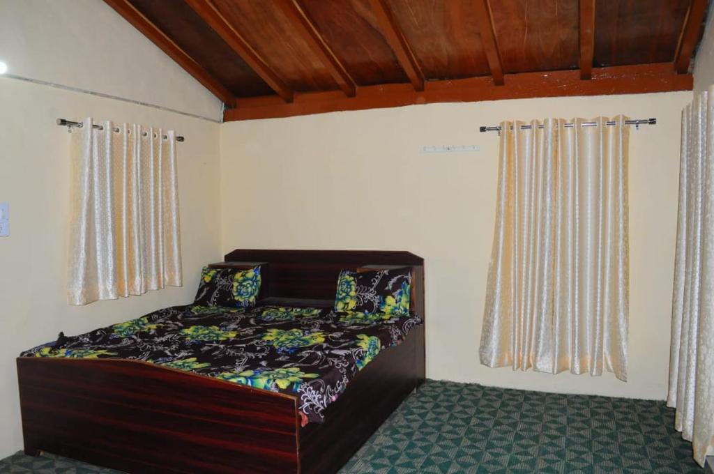 En eller flere senger på et rom på Welcome homestay