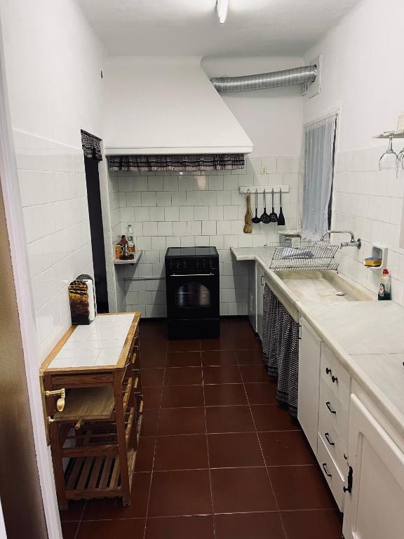 Kuchyňa alebo kuchynka v ubytovaní Casa iaia