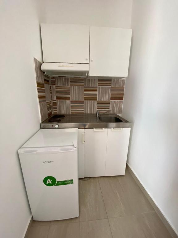 Kuchyň nebo kuchyňský kout v ubytování Villa Loukas