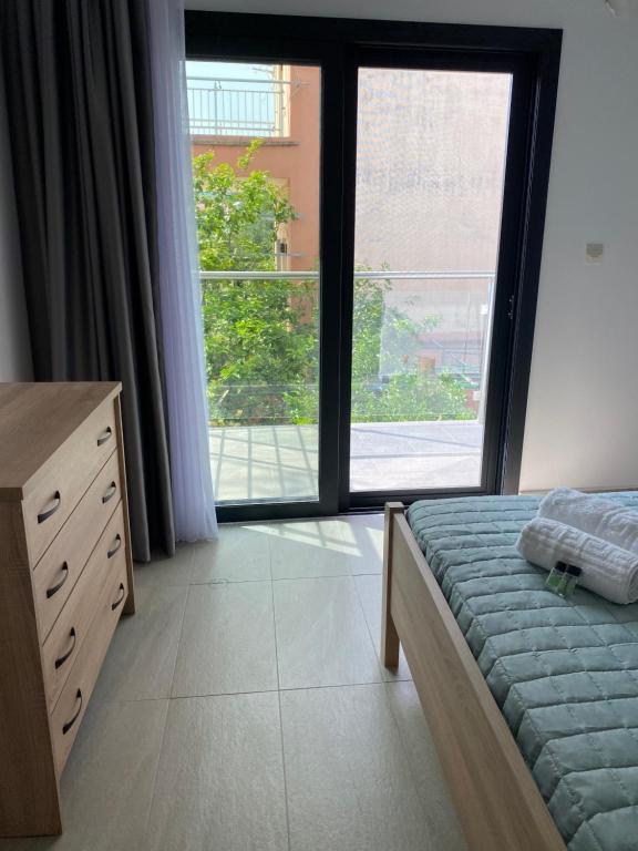 Postel nebo postele na pokoji v ubytování Villa Loukas