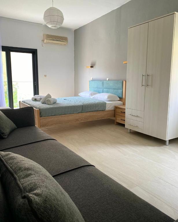 Postel nebo postele na pokoji v ubytování Villa Loukas