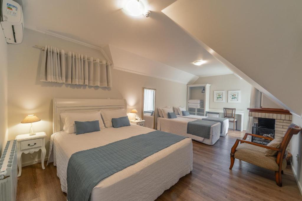 Postel nebo postele na pokoji v ubytování Hotel Monte Felice Bosque