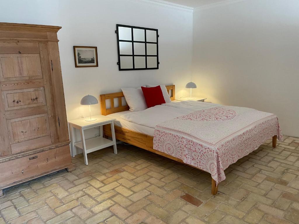 Postel nebo postele na pokoji v ubytování Hotel Brummers Anneks