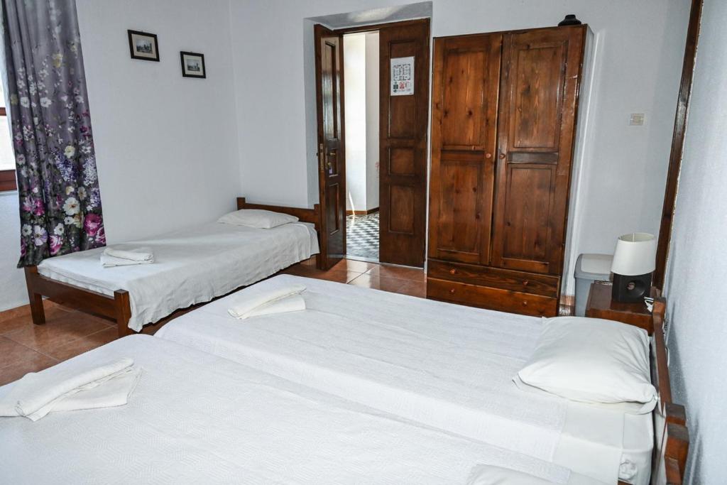 Postel nebo postele na pokoji v ubytování Nymph