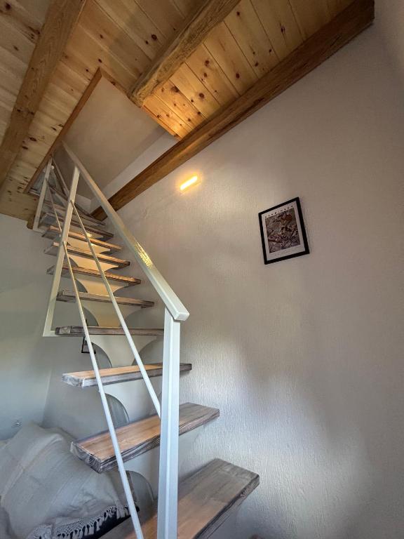 Palanda nebo palandy na pokoji v ubytování Villa Pounta Family
