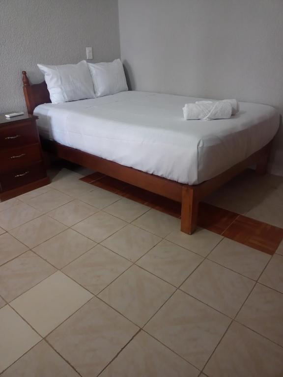 Casa Palenque 객실 침대
