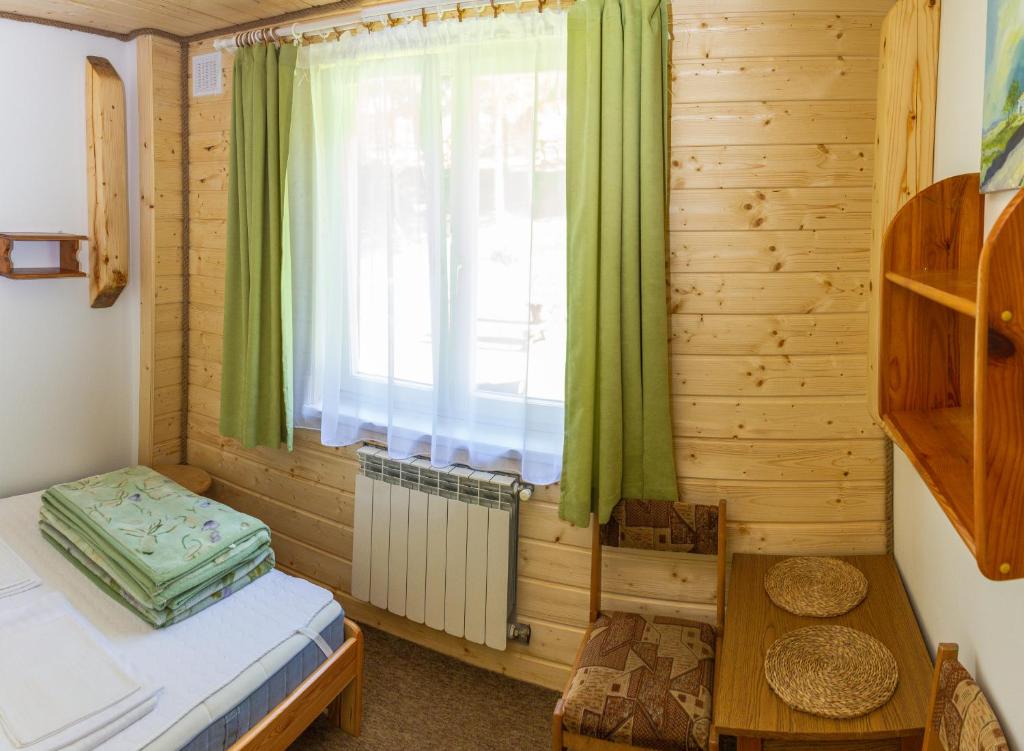 Postel nebo postele na pokoji v ubytování Carynka