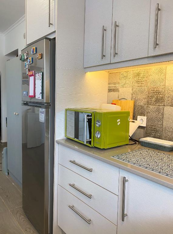 Kuchyň nebo kuchyňský kout v ubytování Aegean breeze apartment
