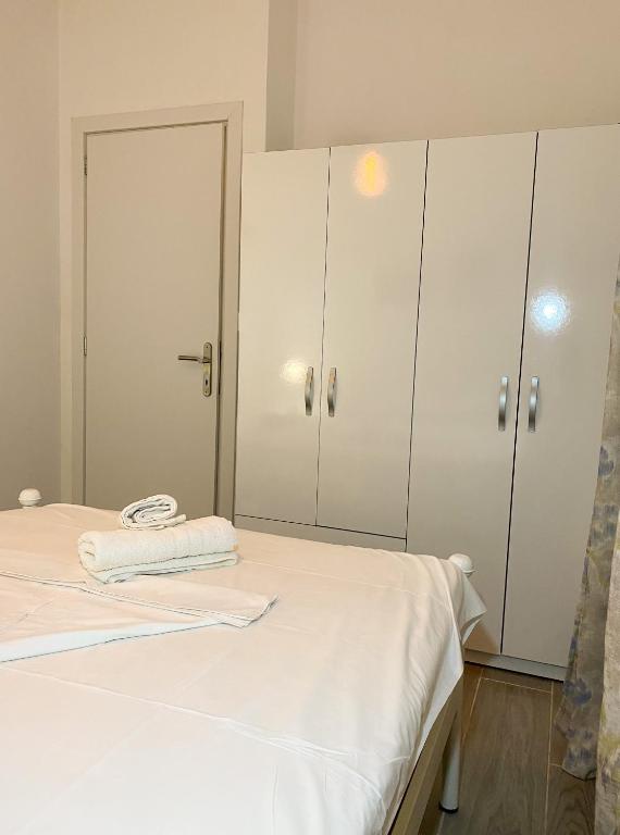 Postel nebo postele na pokoji v ubytování Aegean breeze apartment