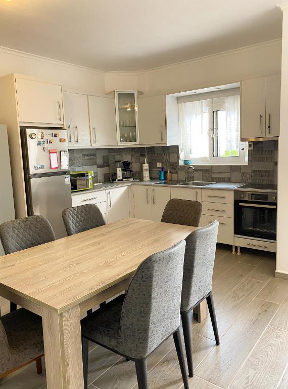 Kuchyň nebo kuchyňský kout v ubytování Aegean breeze apartment