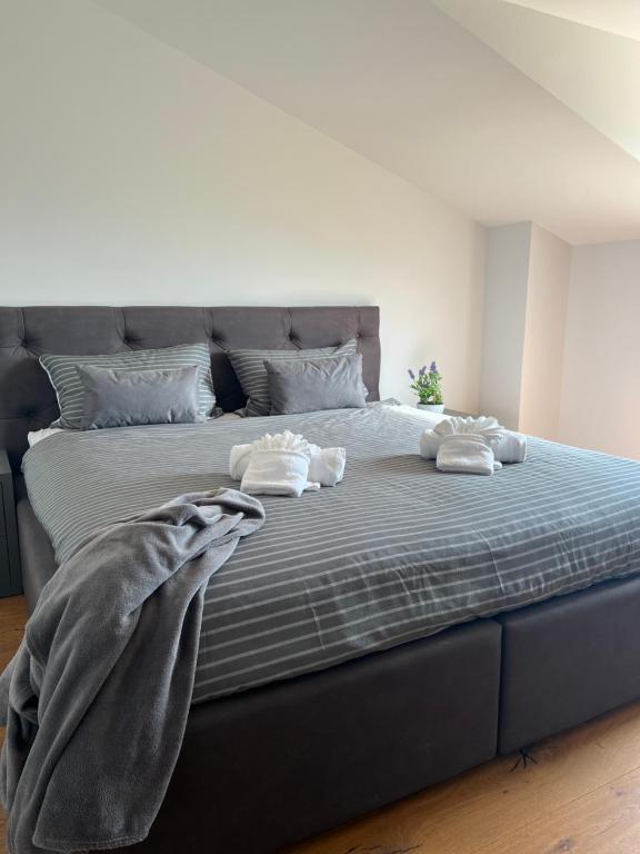 En eller flere senge i et værelse på Apartment Los Anđeles