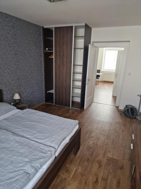 Postel nebo postele na pokoji v ubytování Apartmán Eliášova
