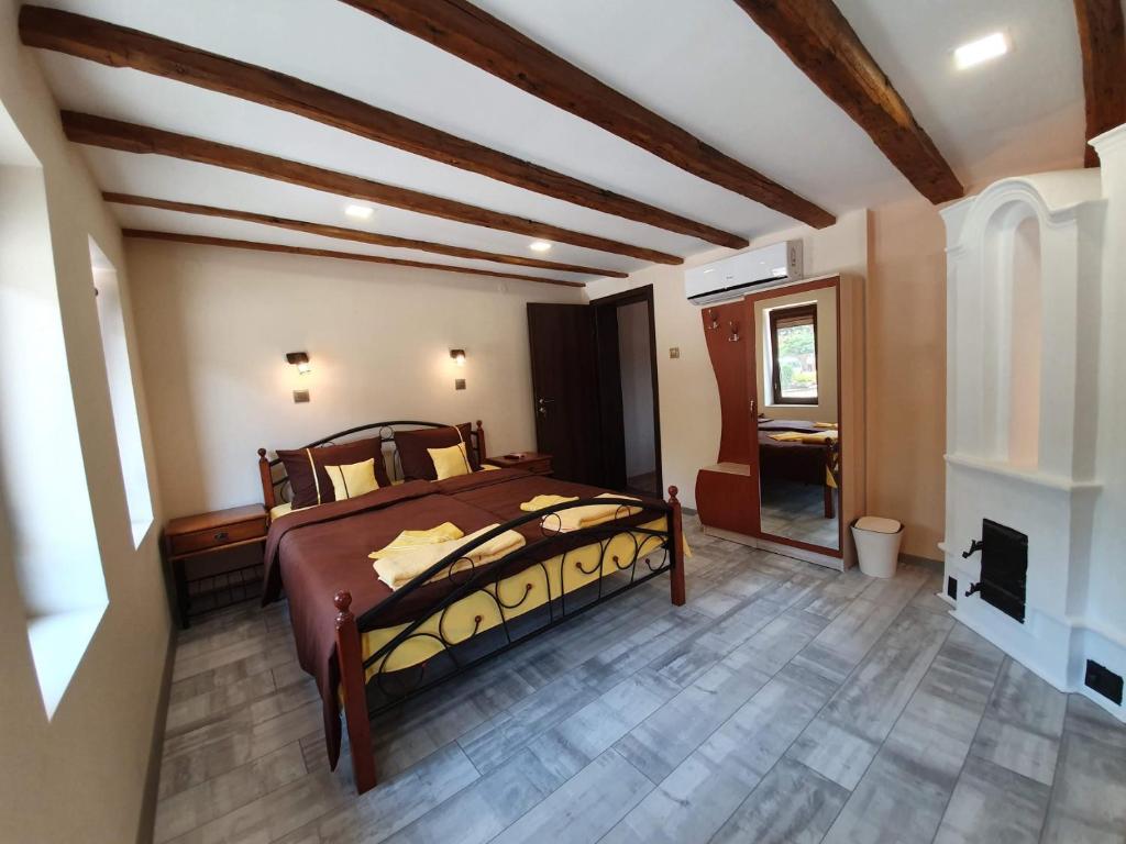 Postel nebo postele na pokoji v ubytování Стаи за гости Елеганс