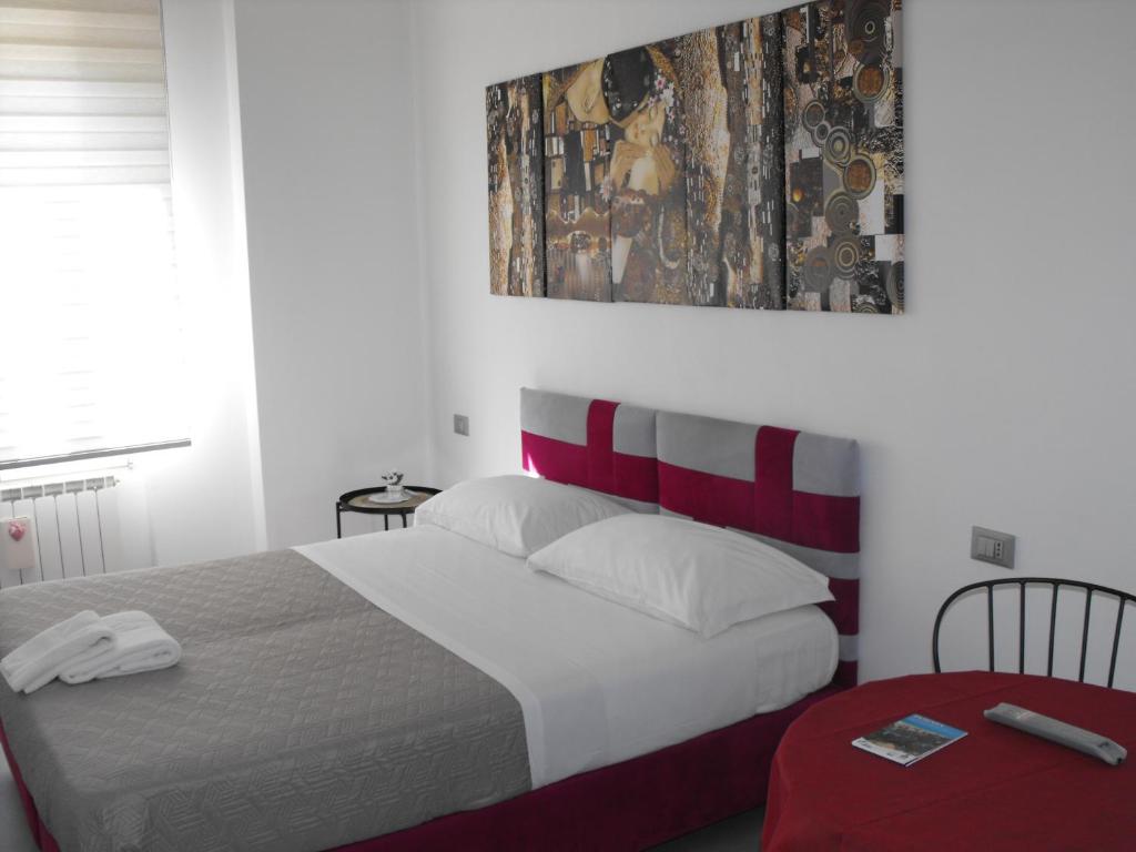 Postel nebo postele na pokoji v ubytování Dimora Chlóe B&B