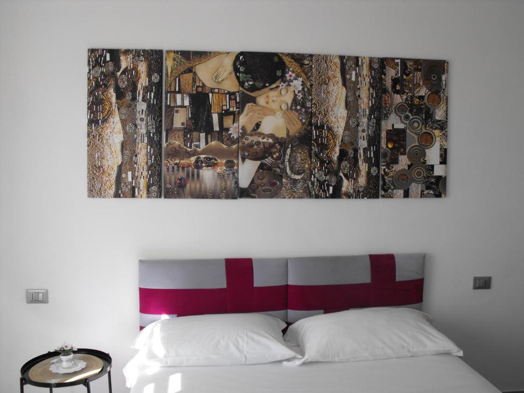Postel nebo postele na pokoji v ubytování Dimora Chlóe B&B