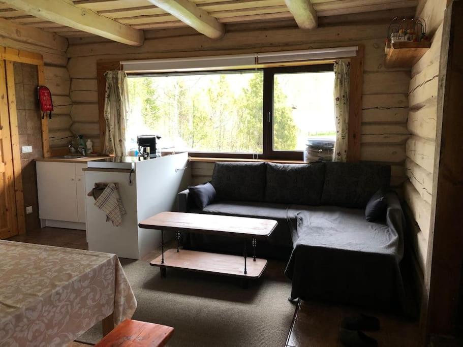 Posezení v ubytování Holidayhouse with sauna and pond