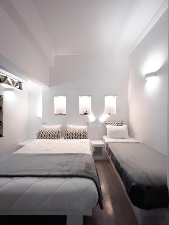 Voodi või voodid majutusasutuse Aggelikoula Rooms toas